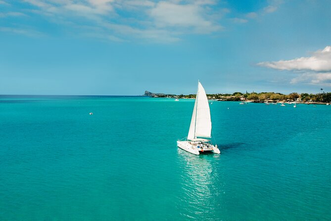 3 North Islands Catamaran Cruise with Lunch & Drinks on island. - Passing Coin de Mire, the volcanic third island