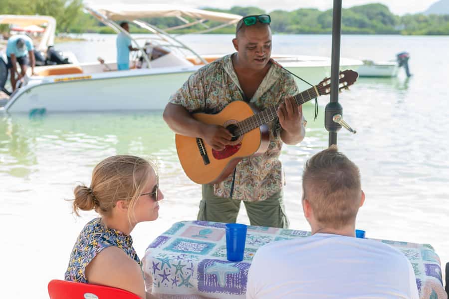 5 Islands Speedboat Cruise, Snorkeling + Lunch & Open Bar - Ile aux Fouqets and its weathered lighthouse