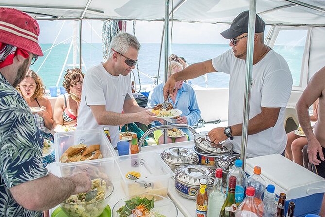 All inclusive CATAMARAN with BBQ : Ile aux cerf & GRSE waterfall - What the $113.97 price really covers