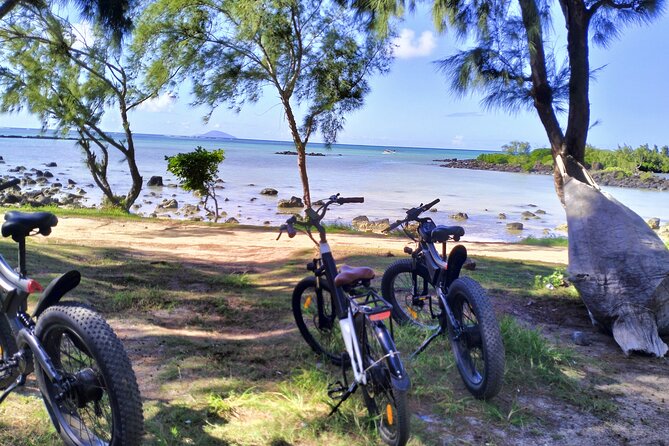Authentic North East Coast E-bikes Guided Tour - Anse La Raie: two coastal stops and a 20-minute swim
