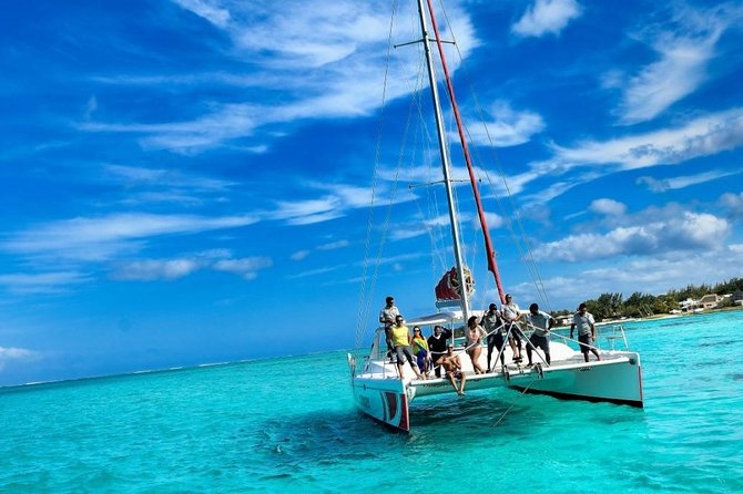 Catamaran Adventure Full Day: Ile aux cerfs,GRSE Waterfall,Snorkeling &BBQ Lunch - Snorkeling in the Trou d’Eau Douce lagoon