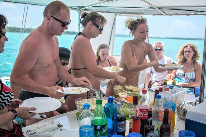 Catamaran cruise to Ile aux cerfs with bbq lunch - The crew sets the tone