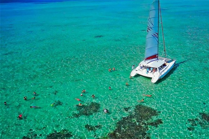 Catamaran to Ile aux Cerf with Parasailing, Tube Riding & Lunch - Snorkeling in the Trou d’Eau Douce lagoon