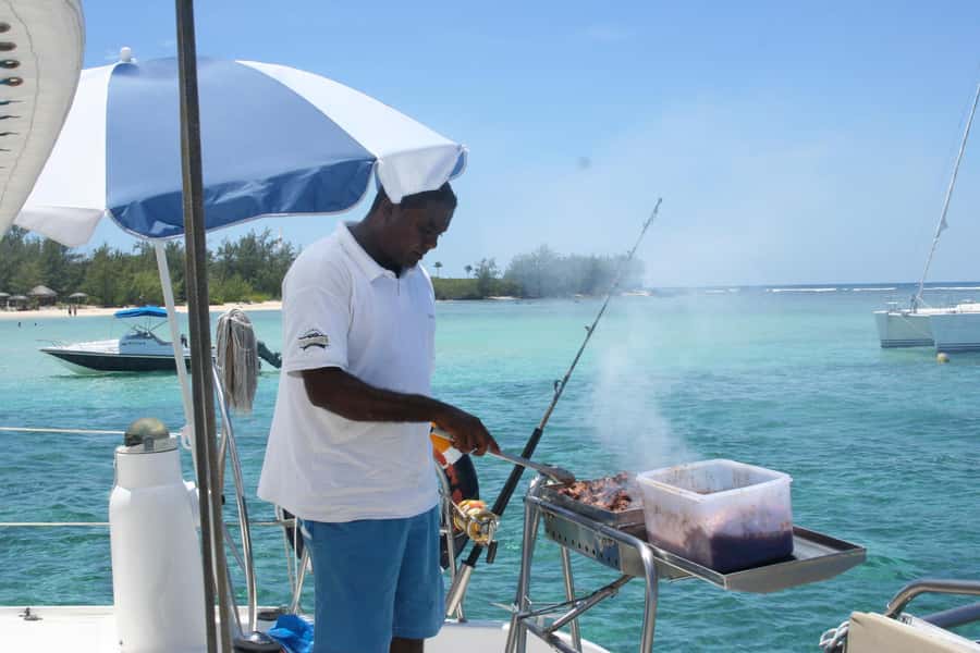 Catamaran Trip to Ile au Cerfs with Lunch and GRSE waterfall - The return sail with music and local character