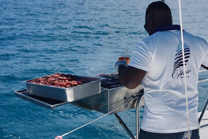 Full Day Catamaran Cruise on shared basis to Bénitiers Island - Weather, Timing, and What to Pack