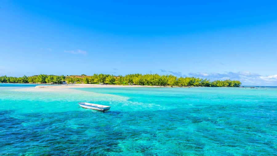 Grand Bay: Catamaran Cruise to Flat Island with BBQ Lunch - From Grand Baie beach to the open sea