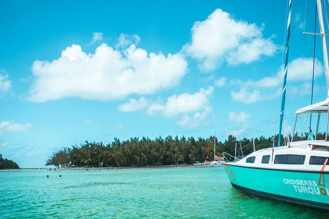 Mauritius : Full day All inclusive Ile aux cerfs Catamaran cruise - Crew service, music, and the mood on board