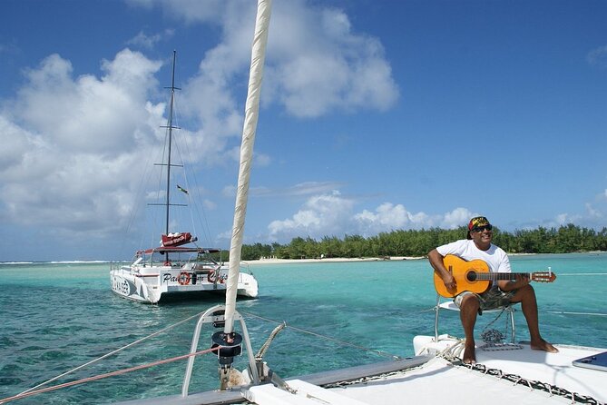 Mauritius: Ile Aux Cerfs Catamaran Tour with Lunch and Drinks - Cruising from Trou d’Eau Douce toward the falls