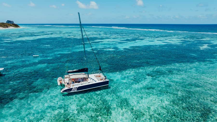 North of Mauritius: Catamaran Cruise w/ BBQ Lunch - Gabriel Island’s clear lagoon and sandy shore