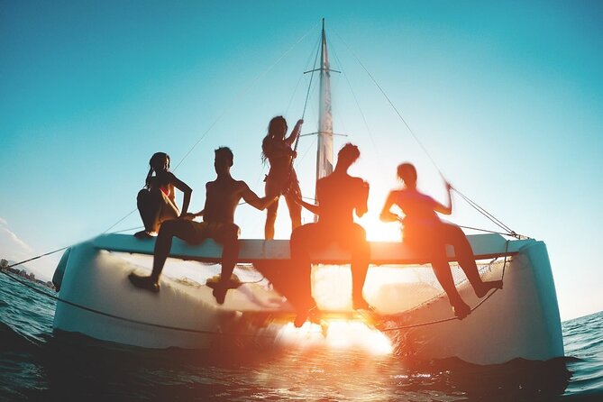 Private Exclusive Sundowner catamaran with Dinner & Transfer - The possible snorkeling stop