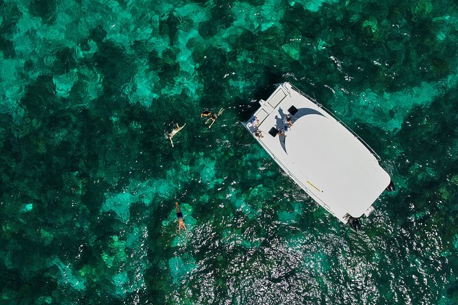 Private Power Catamaran trip from Pointe Jerome - Snorkeling equipment is included, but pack your own towel