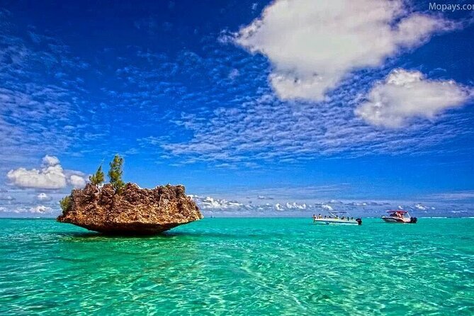 Private Speed Boat Tour and Dolphin Encounter at Ile aux Benitier - Crystal Rock and the view toward Le Morne