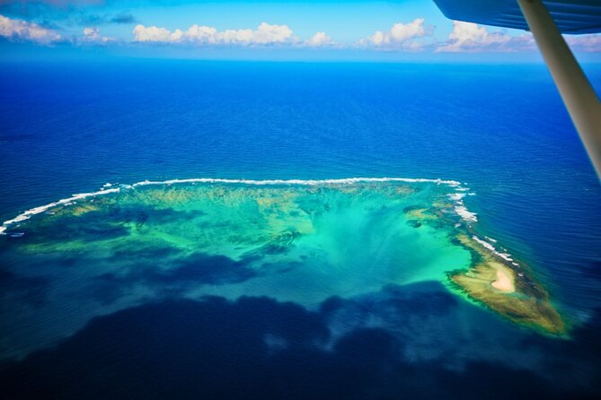 Seaplane Tours over the turquoise lagoon of the East of Mauritius - Grand River South East Waterfalls from above