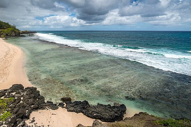 Wild South with Waterfalls & Rare Exotic Viewpoints with Lunch - Gris Gris Beach shows a wilder shoreline